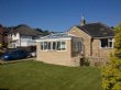 An alternative use of an Orangery: A new porch.